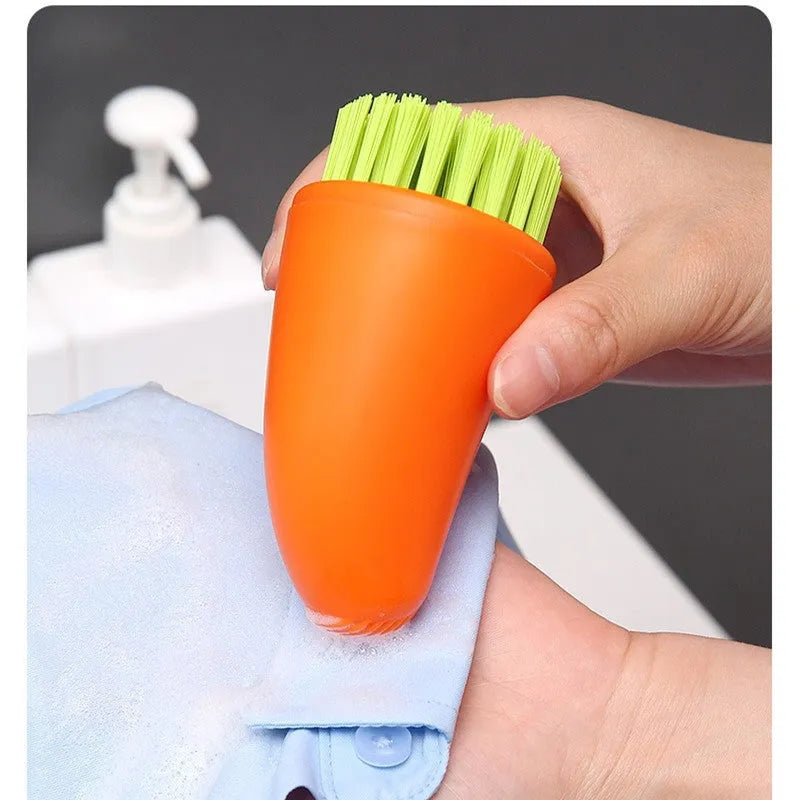 Carrot-shaped nylon kitchen cleaning brush in orange colour, 14.5cm length