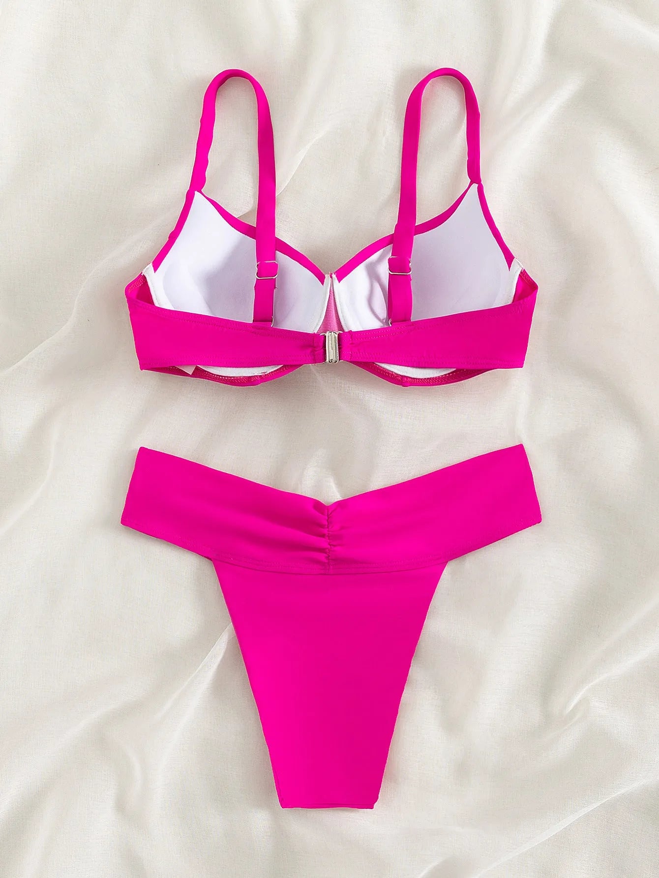 Women's solid colour bikini briefs in nylon for swimming and sports.