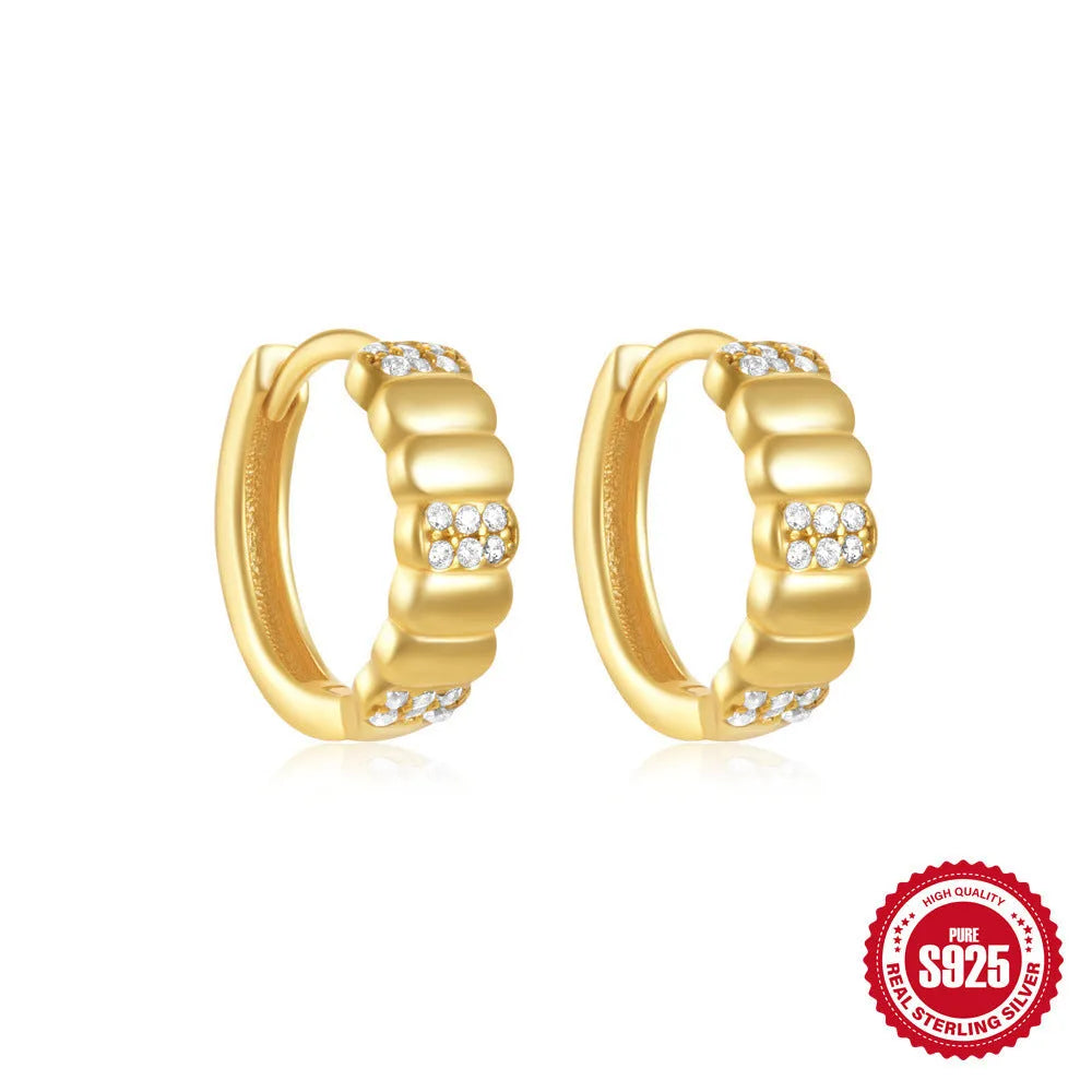 Geometric circle stud earrings in sterling silver with diamond accents and electroplated gold or silver finish