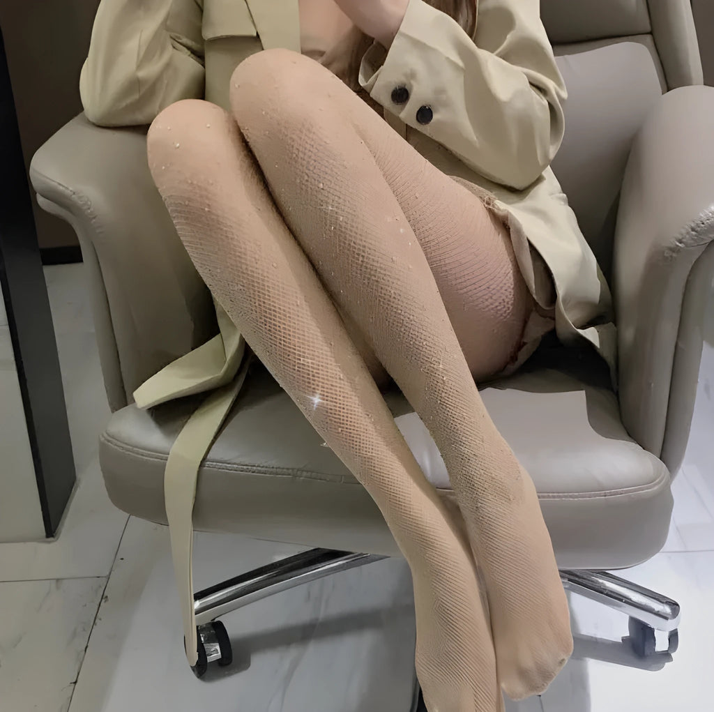Women's nylon fishnet stockings in diamond mesh pattern, shown in skin colour.