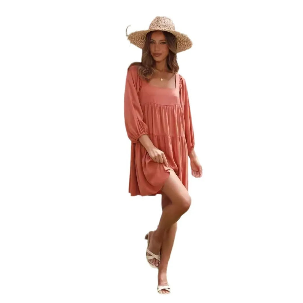 Children's orange backless dress with square collar neckline and puff sleeves in A-line silhouette