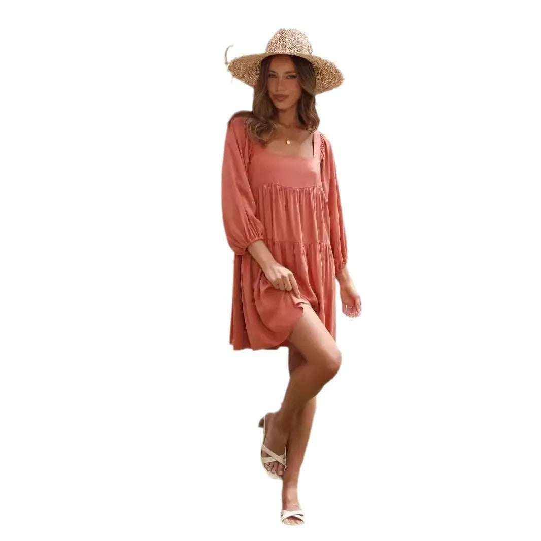 Children's orange backless dress with square collar neckline and puff sleeves in A-line silhouette