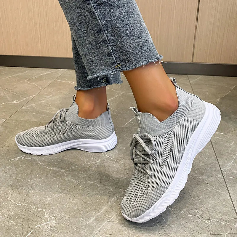 Women's breathable mesh running shoes in three colour options with flyknit upper and rubber sole