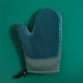 Pet hair removal glove with TPR nubs on mesh fabric, shown in dark blue, for grooming cats and dogs.