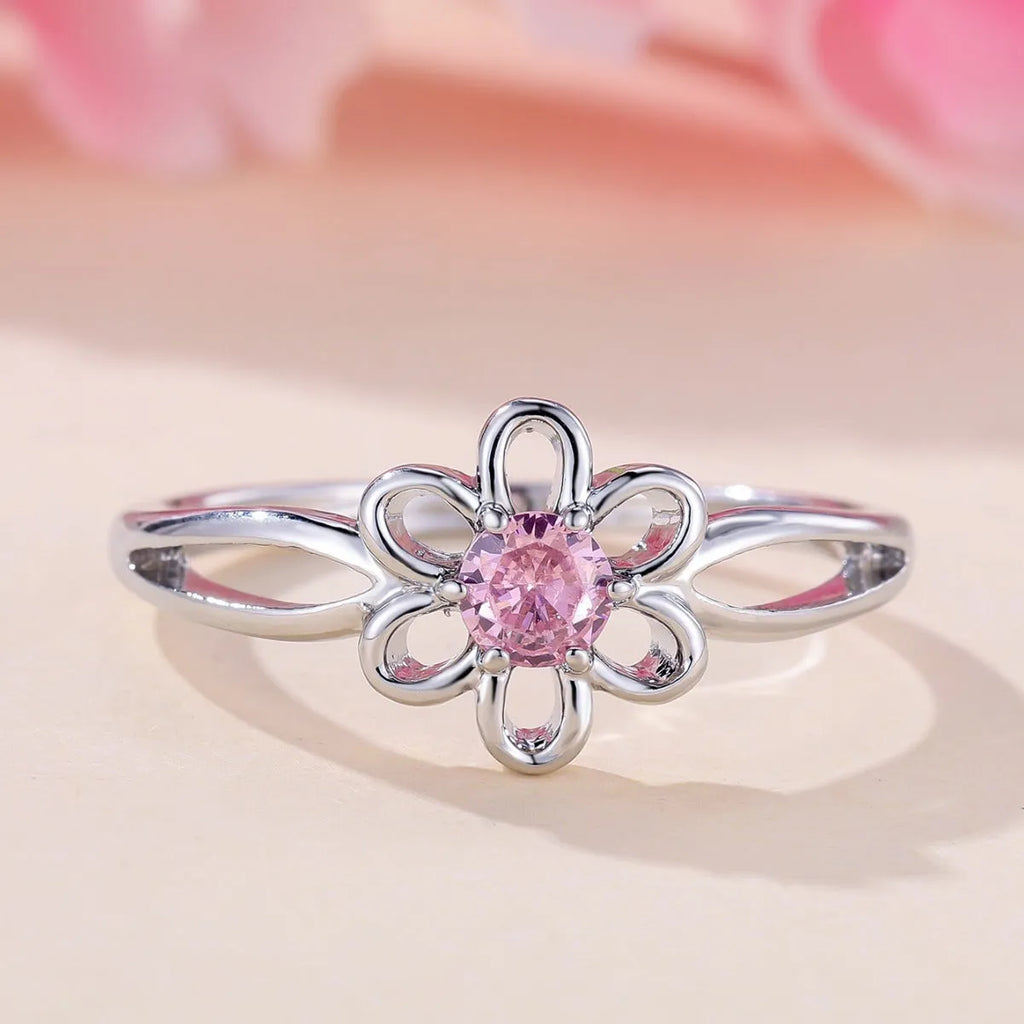 Women's copper ring with hollow floral design in electroplated platinum pink diamond colour