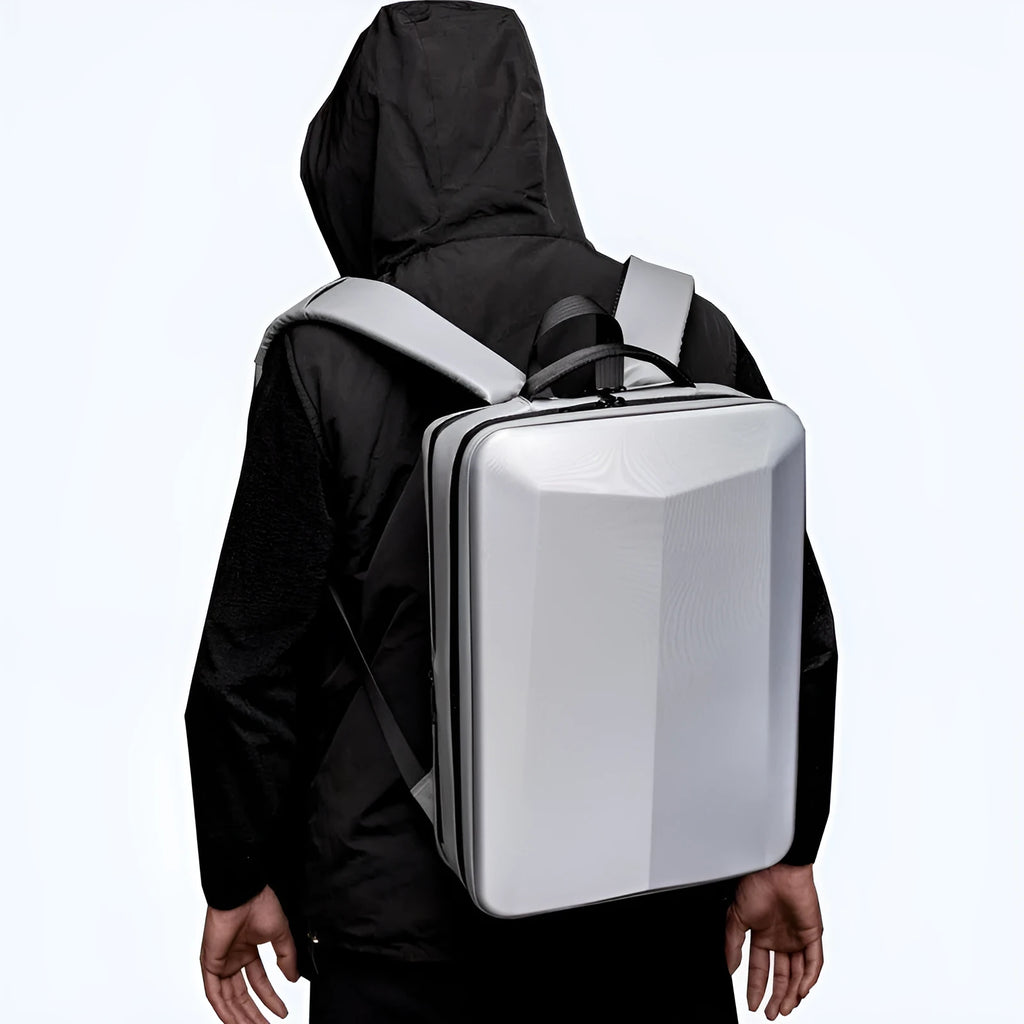 Men's waterproof business backpack in black and silver white colours showing curved shoulder straps and splicing design elements