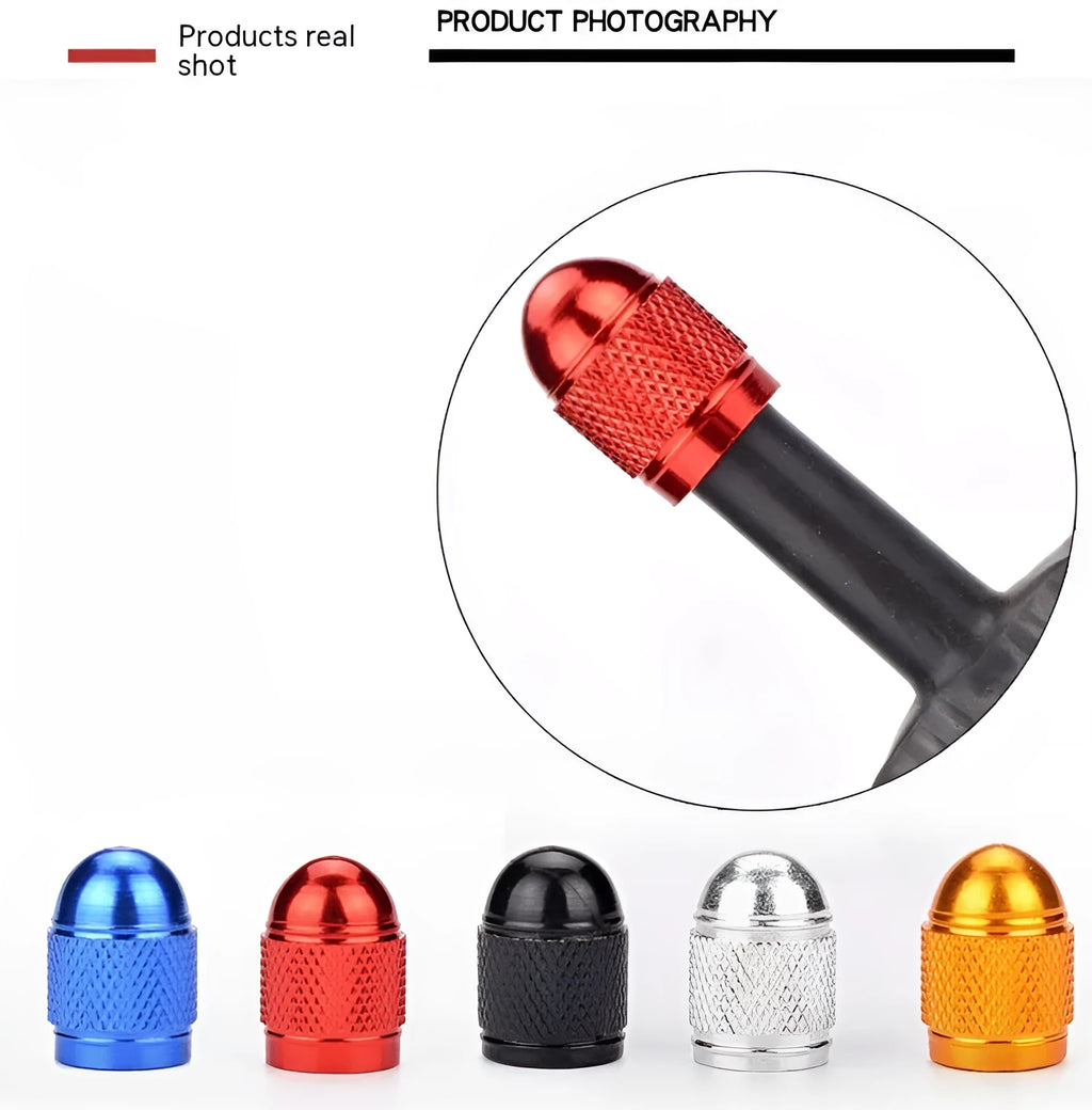 A single aluminium mountain bike tyre valve cap shown in a choice of five colours: black, blue, gold, red, and silver.