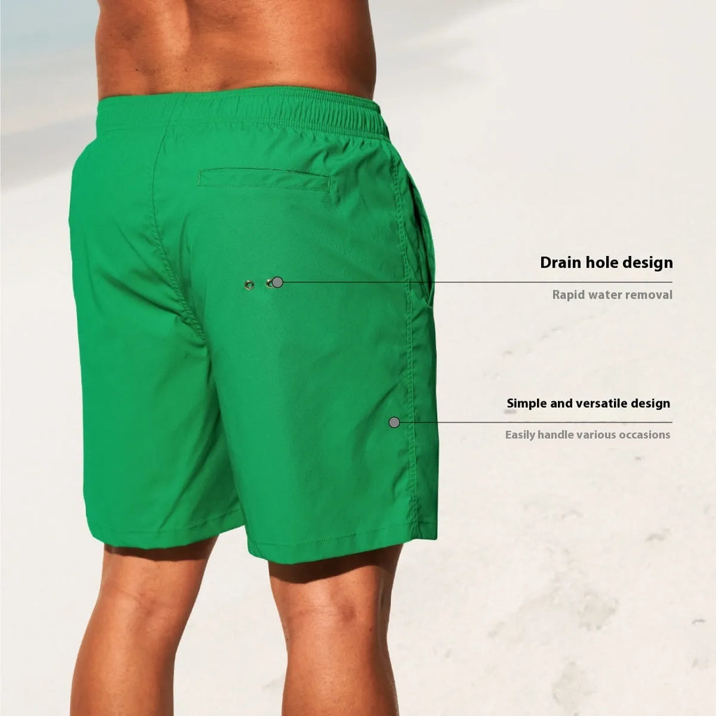 Men's quick-drying nylon sports shorts in solid colours with straight leg opening.