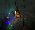 Solar garden lamp with tapered butterfly pattern in iron construction, warm white LED light