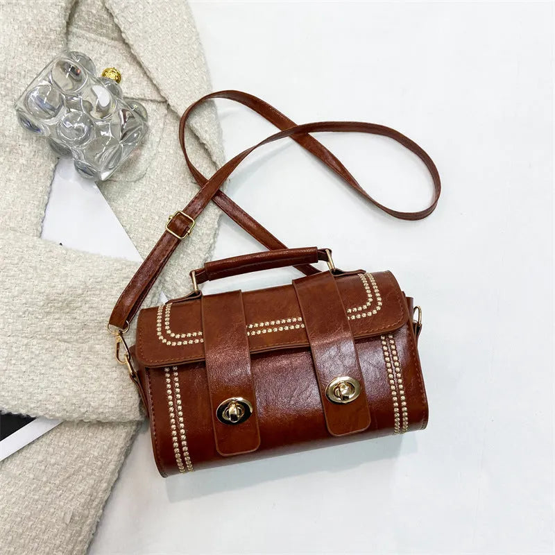 Versatile fashion portable messenger bag in black PU with three-dimensional pocket, square shape