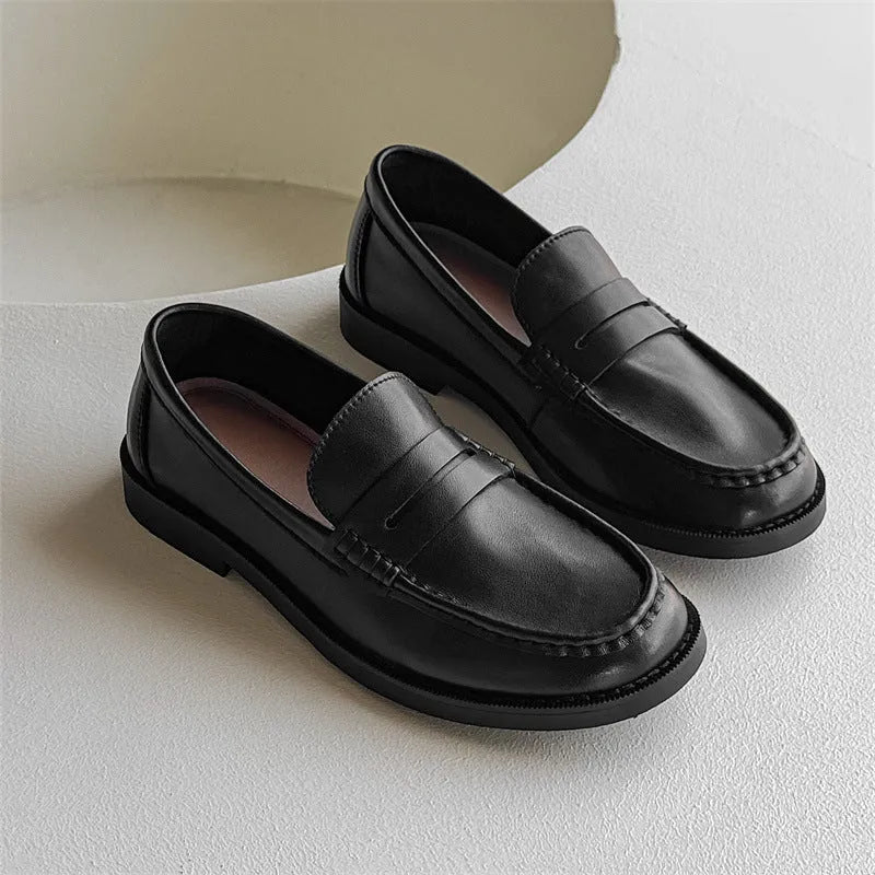 A pair of men's slip-on casual shoes in microfiber, shown in one of four colours: black, beige, apricot, or brown.