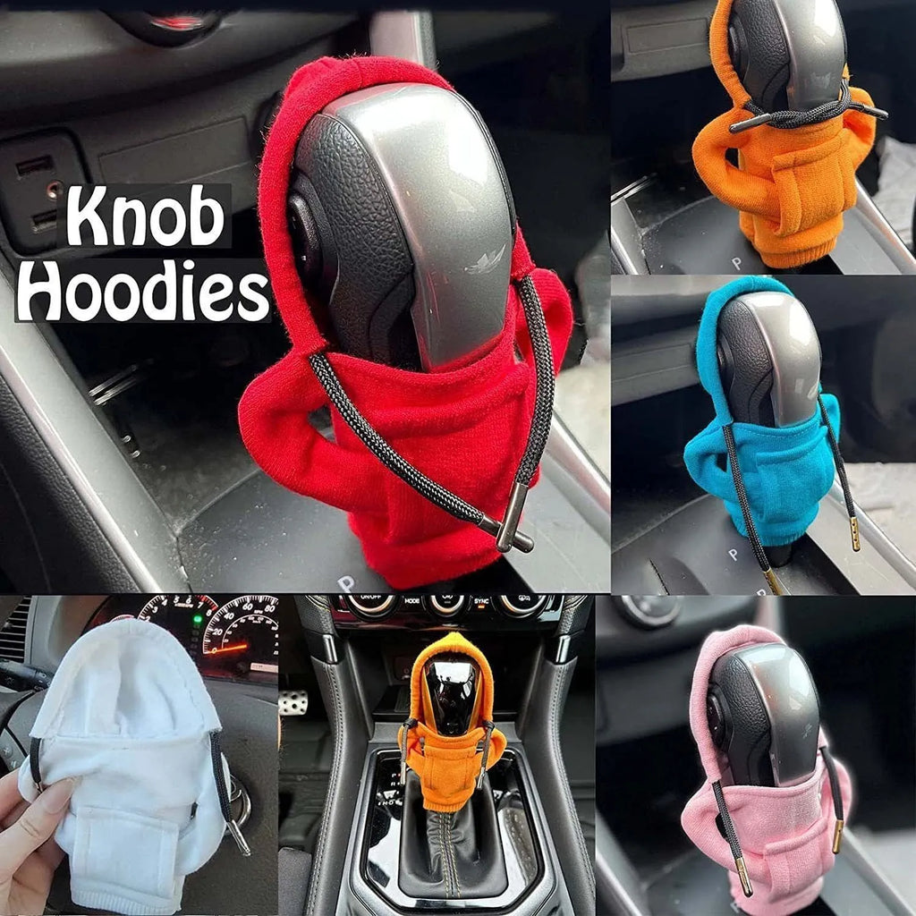 Cloth gear shift knob hoodie cover shown in multiple colours next to a car gear lever.