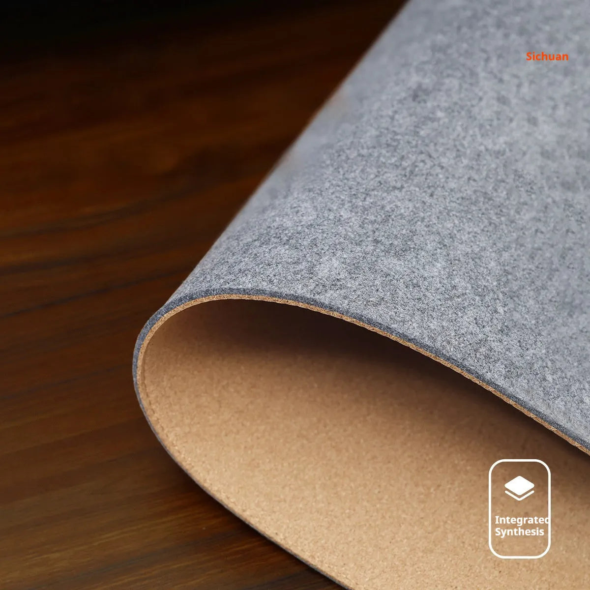 Oversized grey felt and cork desk mat with Japanese style simple design on a wooden desk