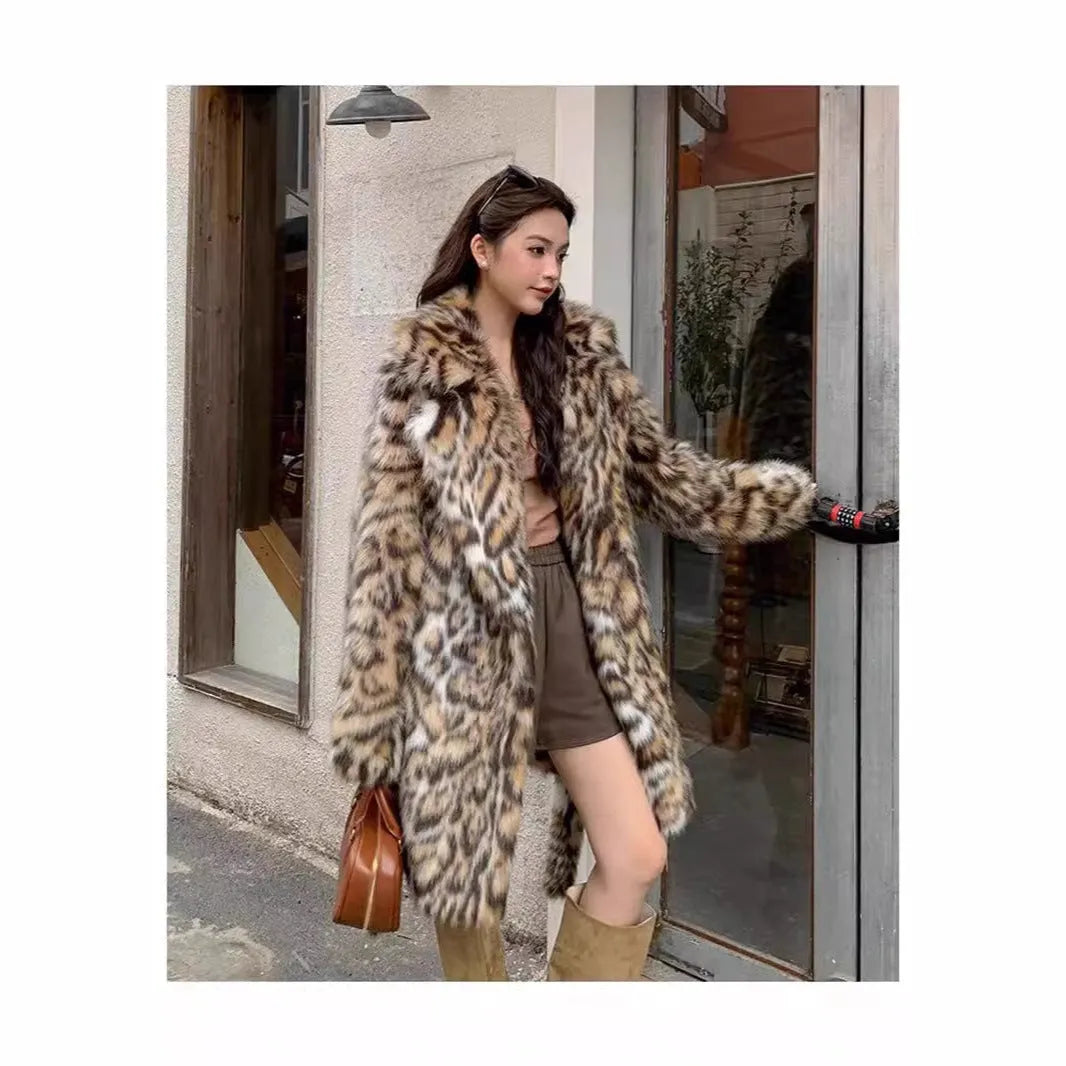 Faux fur coat with fur collar available in mid-length or long style with pockets