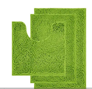 Dark green chenille three-piece U-shaped toilet mat set with non-slip TPR backing on bathroom floor.