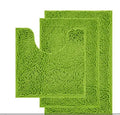 Dark green chenille three-piece U-shaped toilet mat set with non-slip TPR backing on bathroom floor.