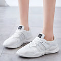 Breathable hollow mesh sneakers in black and white colours with round toe design