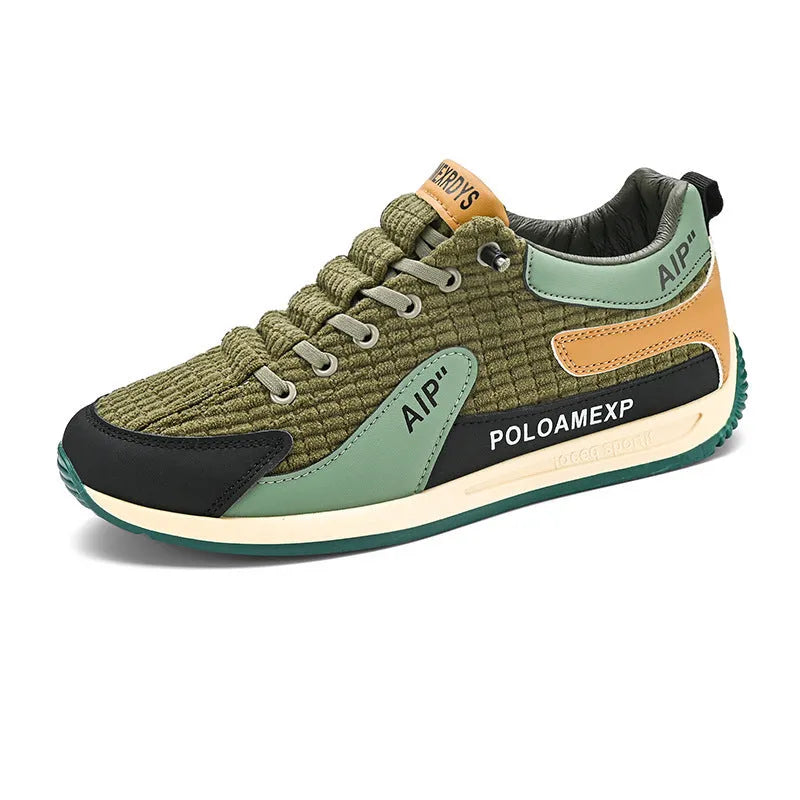 Men's grey mesh running shoes with round toe and lace-up closure on sports surface