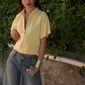 Casual loose-fit polyester top with short regular sleeves in black, white or yellow