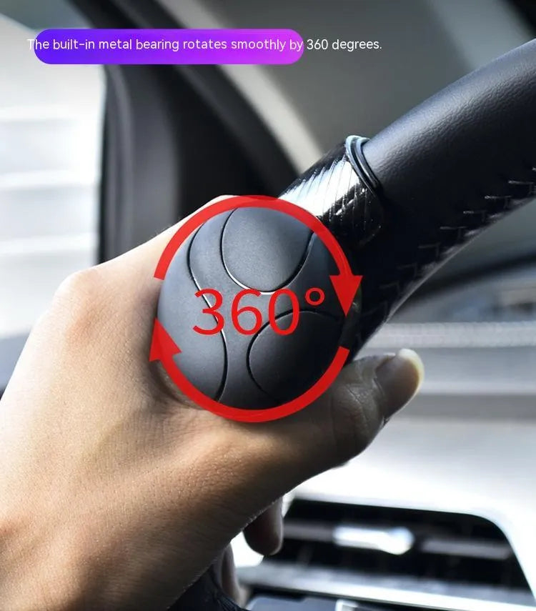 Black and blue steering wheel assist balls with silicone construction and metal bearing mechanism