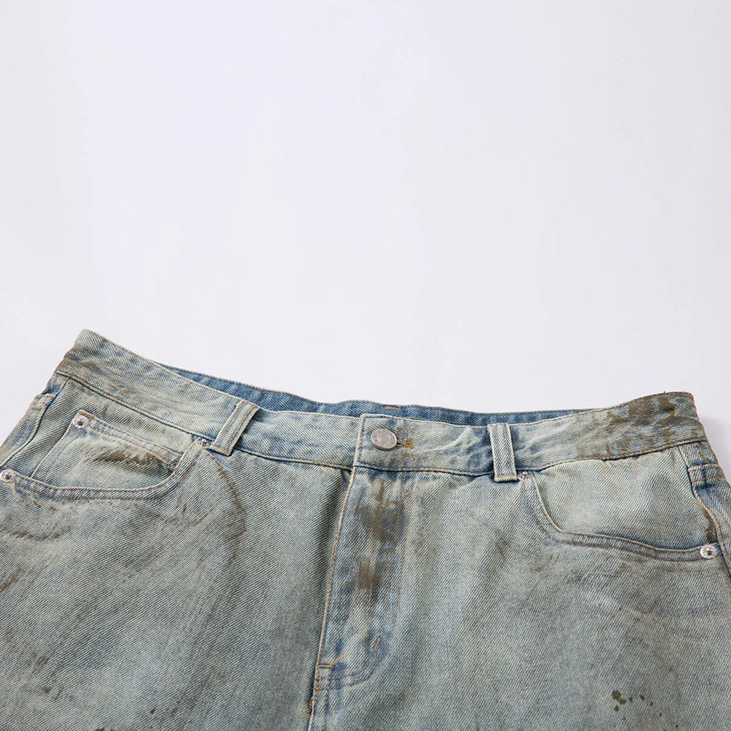 Blue washed denim straight-leg mid-length trousers with zipper fly closure