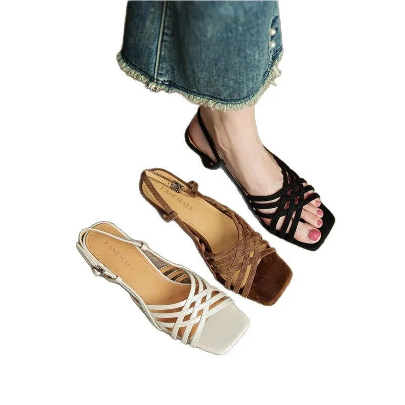 Retro soft leather-look women's sandals with thin cross straps, square toe, ankle buckle, and a mid-height heel