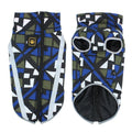 Dog wearing reflective warm shell jacket in geometric blue pattern, polyester construction with European styling
