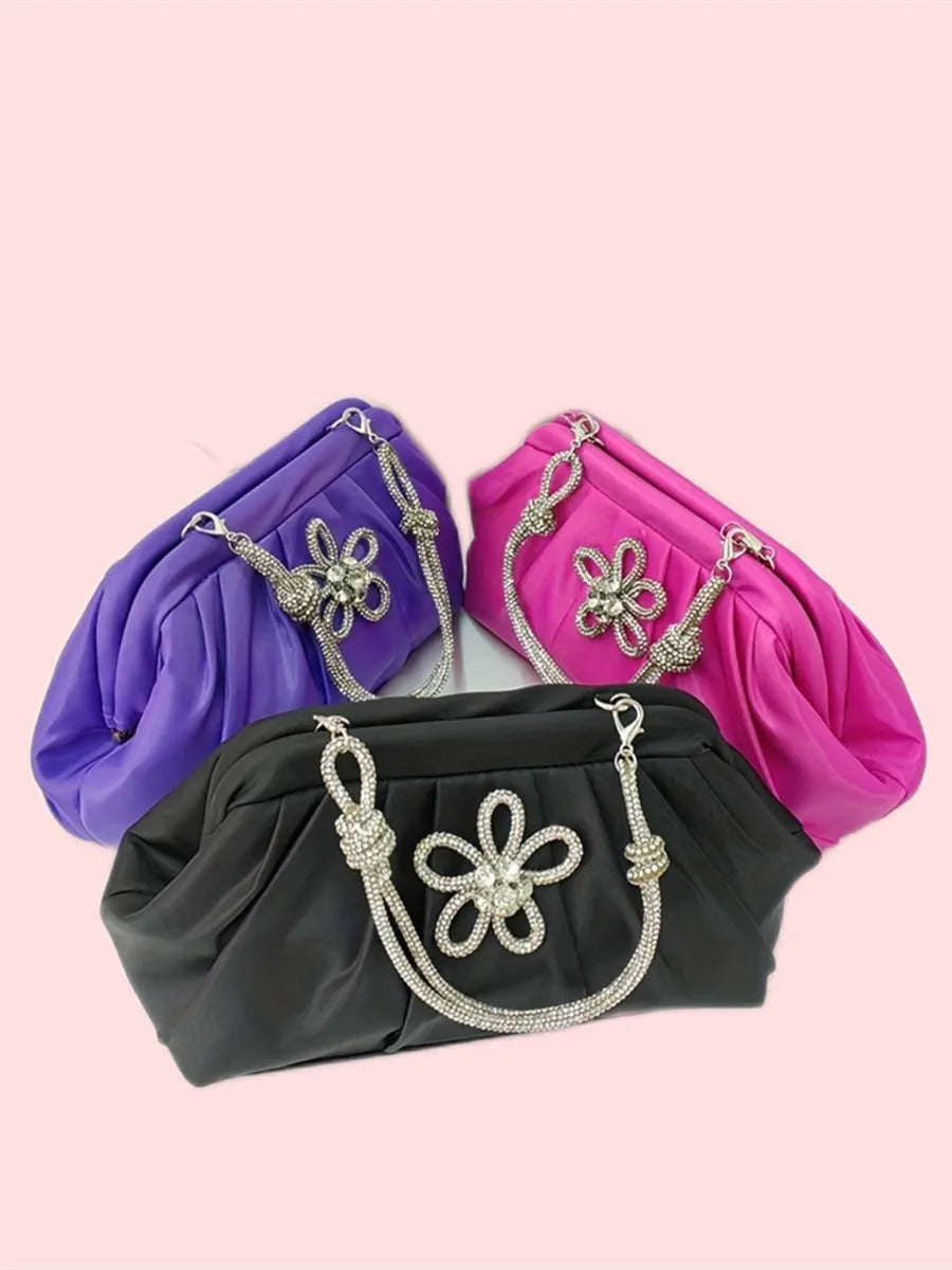 Women's soft polyester shoulder messenger bag in shell shape with diamond folds and chain detail.