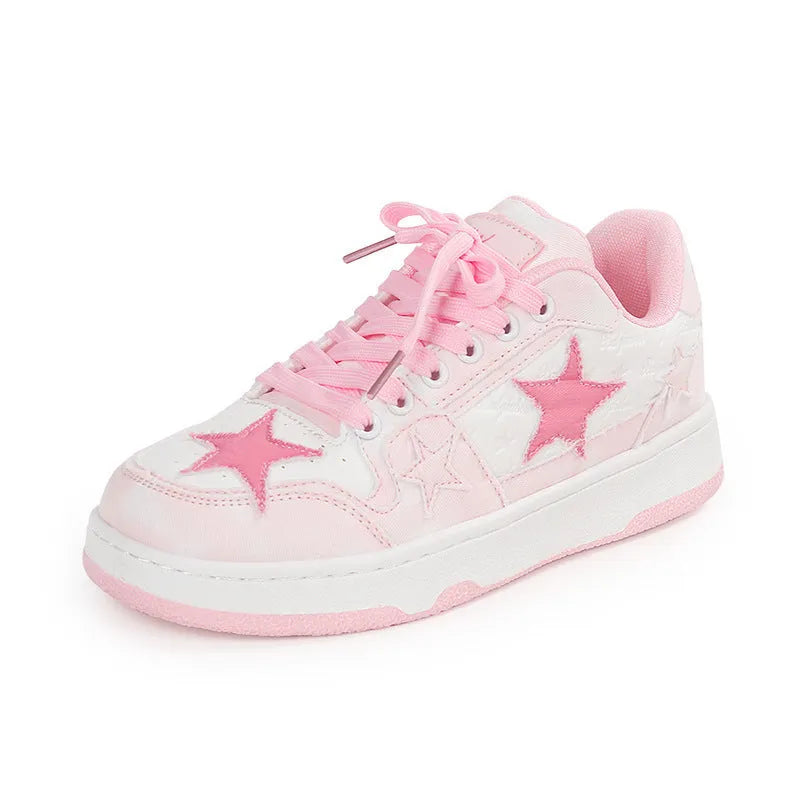 Denim skateboard shoes in black, green, or pink with flat rubber sole and lace-up front.