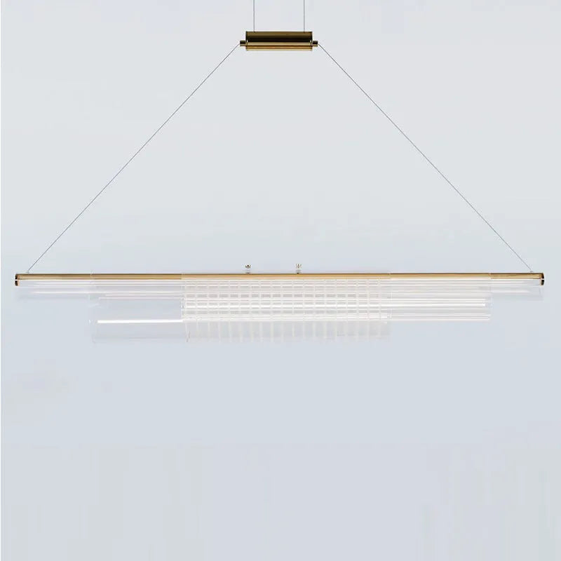 Modern minimalist glass pendant lamp with iron fittings and LED light in three length options.