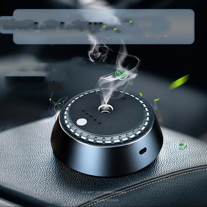 Black metal smart car aroma diffuser with USB port, measuring 9x4.5cm.