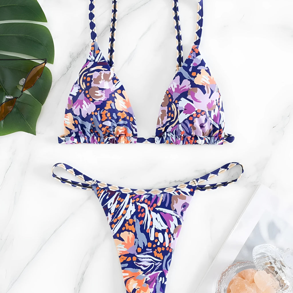 Women's floral print polyester triangle bikini swimsuit with briefs-style bottom.