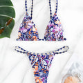 Women's floral print polyester triangle bikini swimsuit with briefs-style bottom.