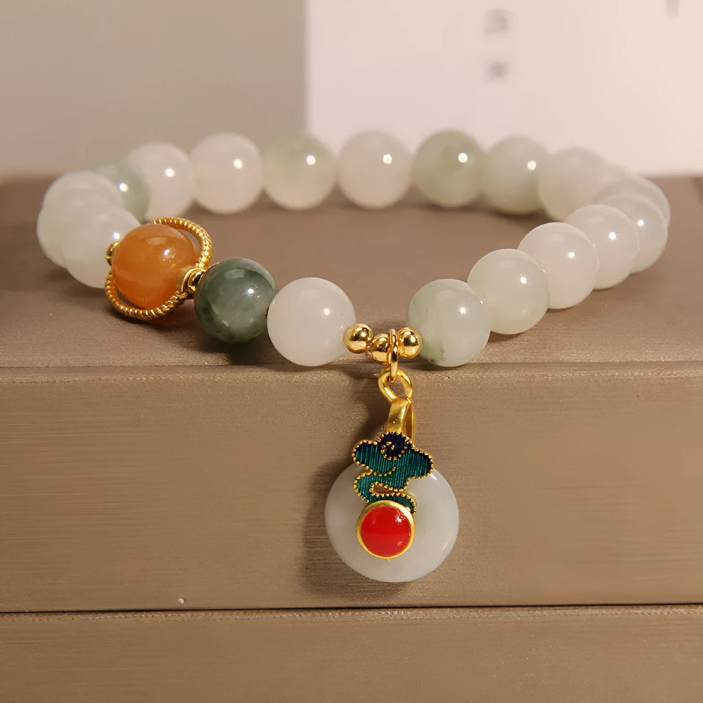 Ice jade crystal bracelet for women with pearl details and a peace jade buckle.