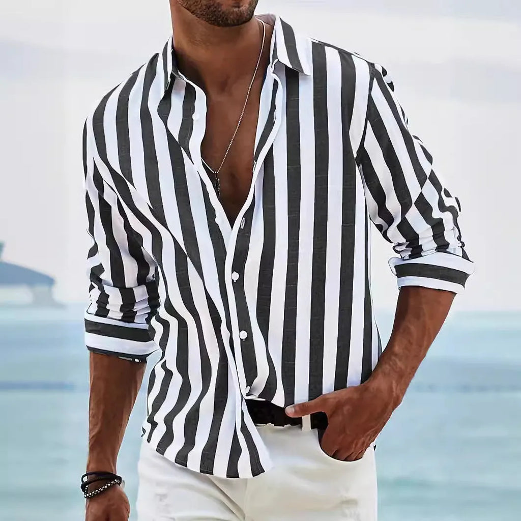 Man wearing a loose grey striped casual long-sleeved shirt with a cardigan style.