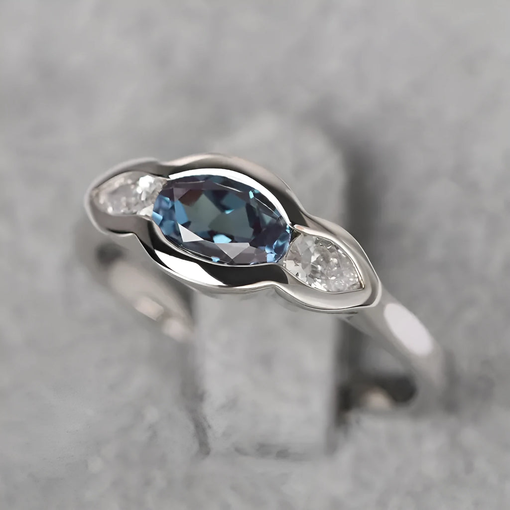 Geometric ellipse women's ring with zircon inlay in white gold colour plating