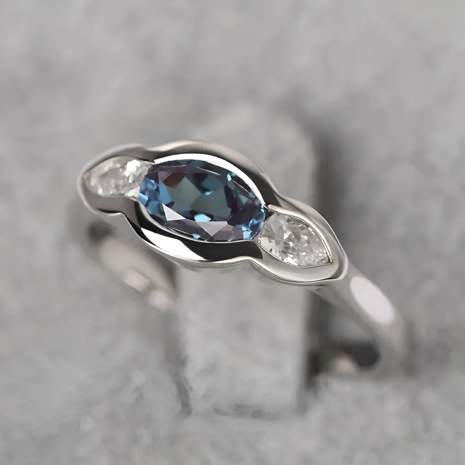Geometric ellipse women's ring with zircon inlay in white gold colour plating