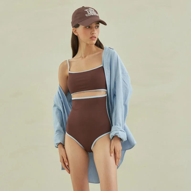 Brown women's one-piece swimsuit with triangle top design