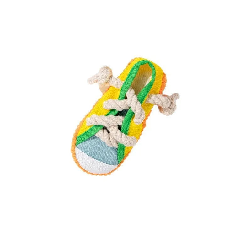 Plastic dog chewing toy with slippers design in choice of three colours for molar relief