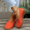 Women's flat loafer shoe in PU leather with a rubber sole, shown in a choice of colours.