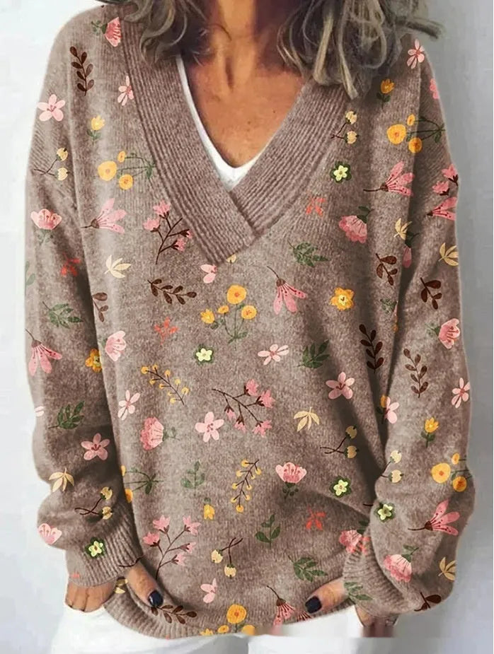 Women's V-neck long sleeve sweatshirt with a detailed 3D floral print pattern.