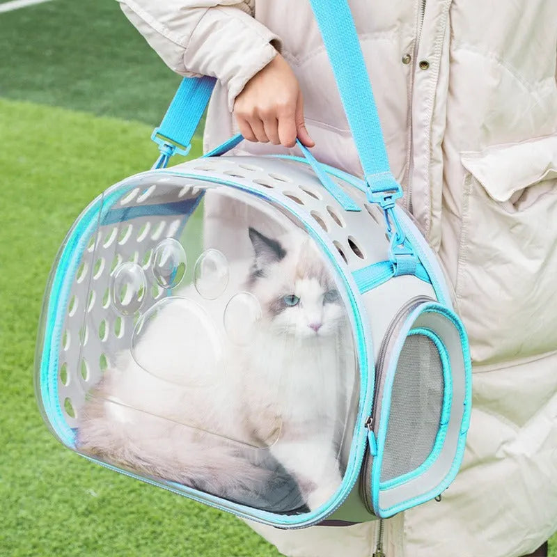 Large transparent hard EVA cat backpack carrier in grass green, shown with folded size.