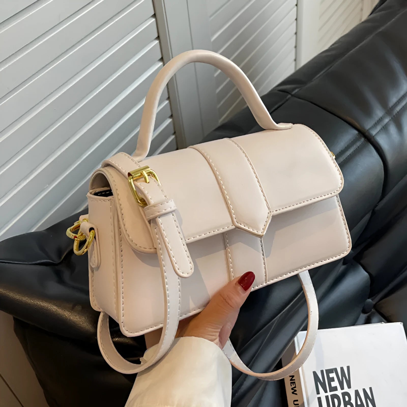 Women's beige PU leather messenger bag with horizontal file organiser and sandwich pocket