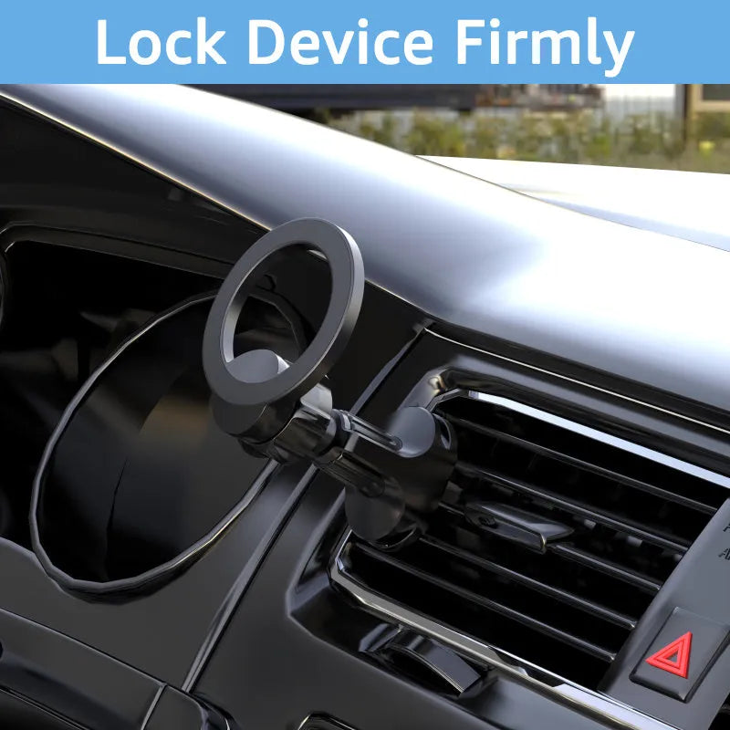 Black magnetic car phone holder attached to vehicle air vent