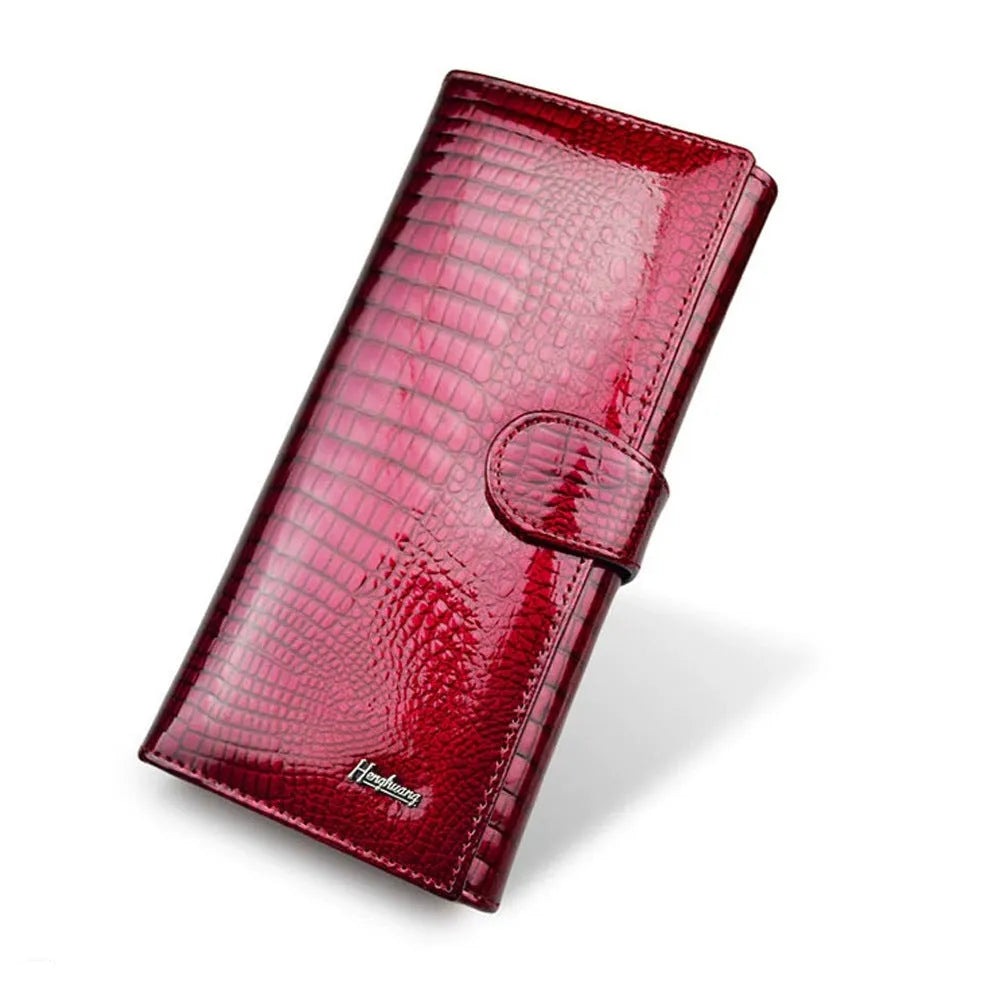 Women's red crocodile pattern leather coin purse with patent finish and pigskin lining interior
