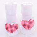 Cotton baby floor socks in various colours and patterns including bows, stars, and animal designs