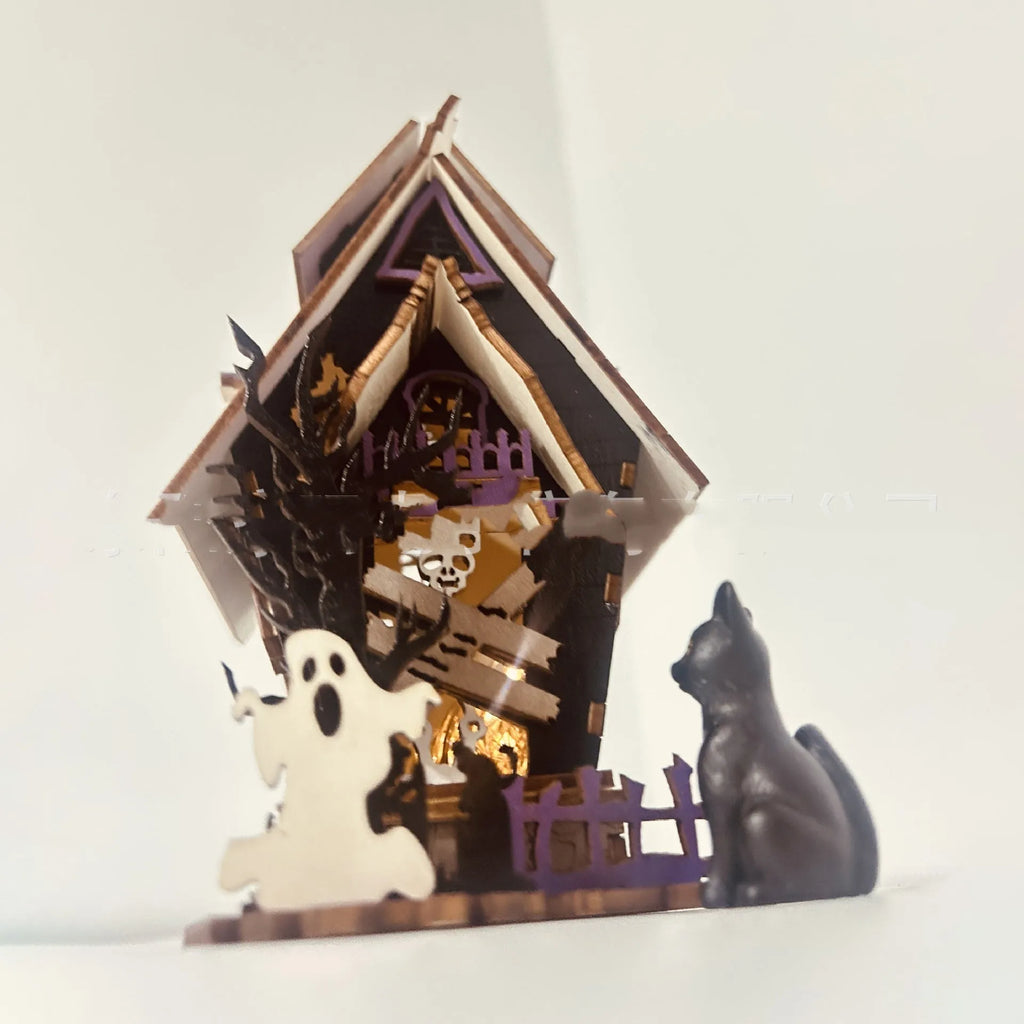 Wooden Halloween haunted house table decoration with luminous glowing design measuring 14 cm wide