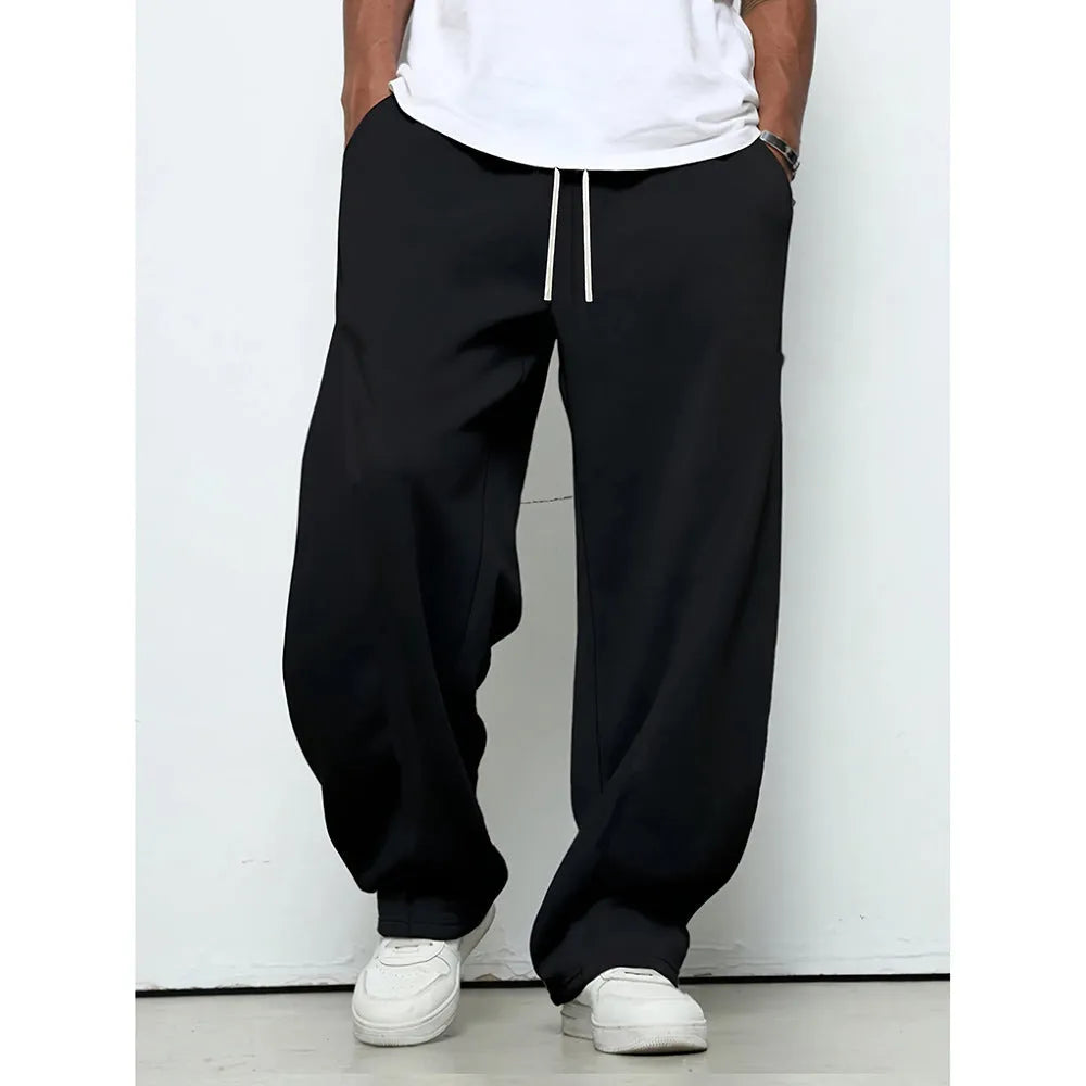 Men's straight-leg casual trousers with elastic waistband in black, dark grey and light grey colours