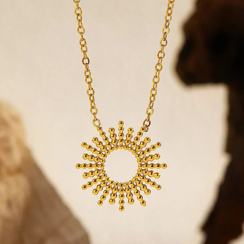 Sunflower yellow gold jewellery set with geometric chain necklace and bracelet