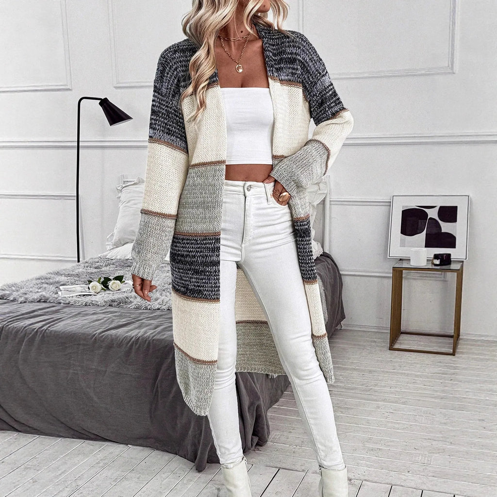 Grey loose fit women's knitted cardigan with long sleeves on hanger